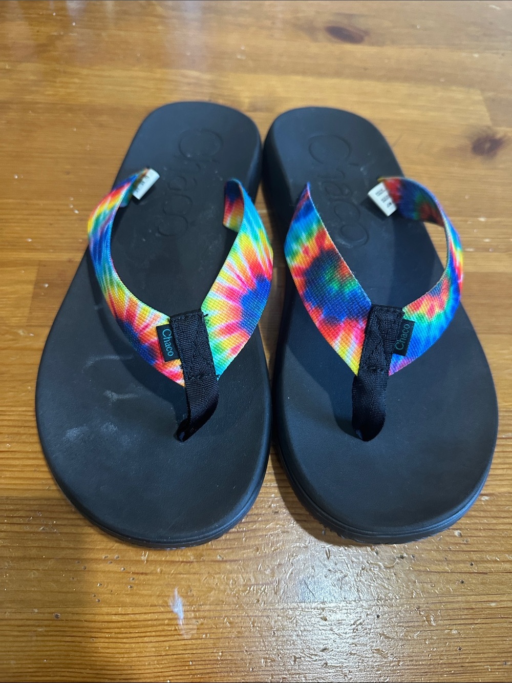 Chaco Black Flip Flops with Rainbow Tie-Dye Straps